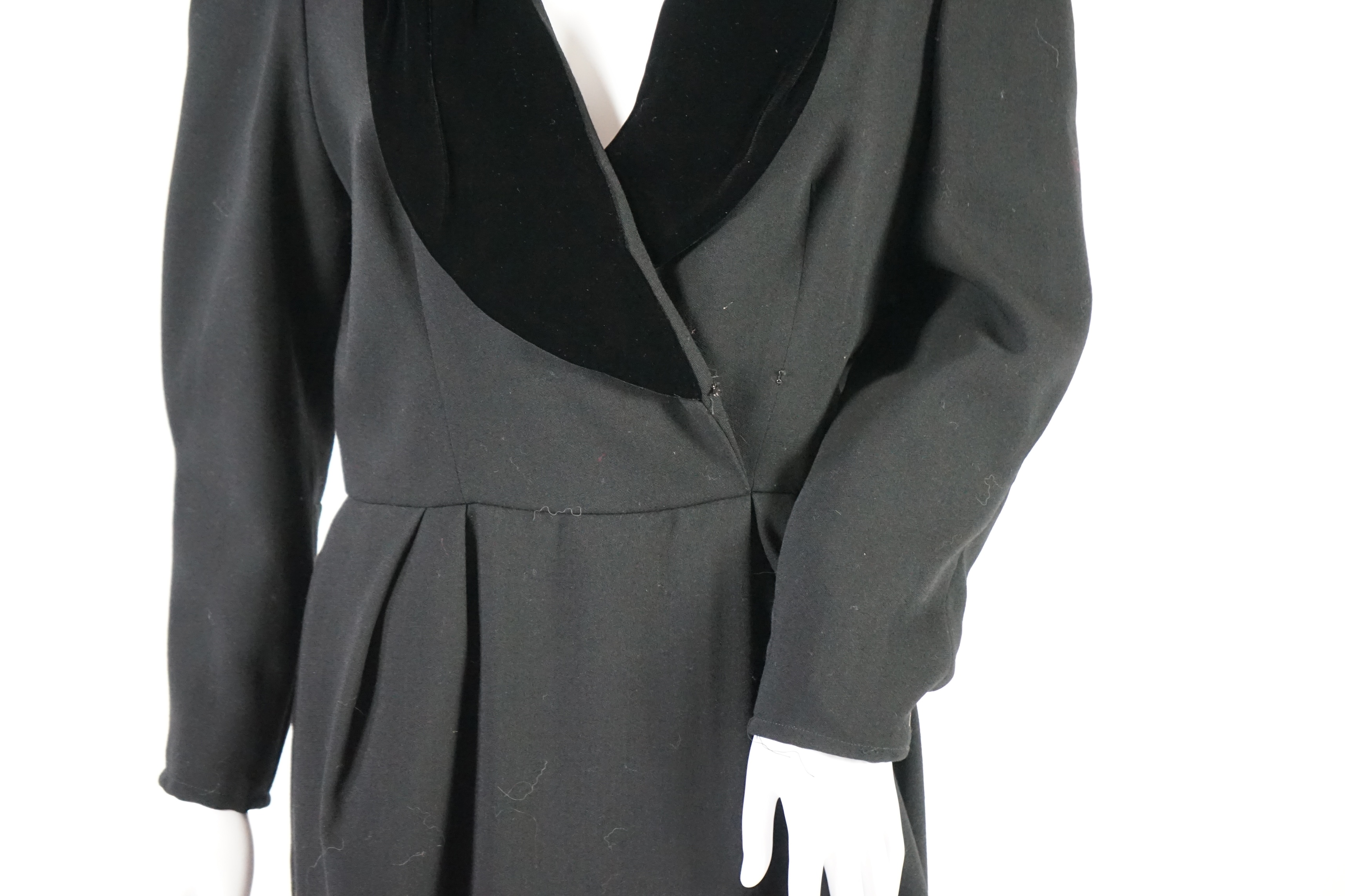 A Bruce Oldfield black evening dress and black bolero style jacket. Size 12-14 Proceeds to Happy Paws Puppy Rescue